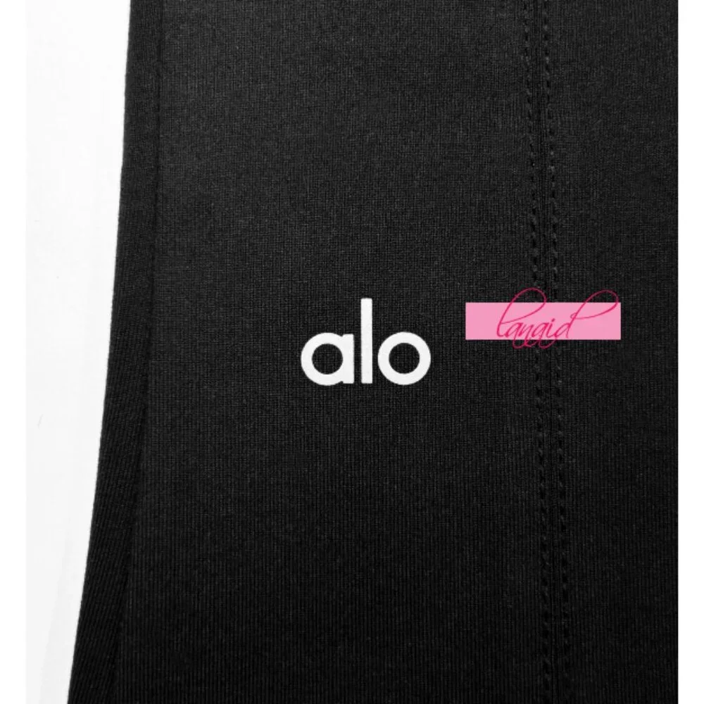 Alo High-Waist Rise Kick-Back Flutter Leggings Black Seamed Back Slit Hem Flare